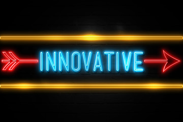 Fototapeta premium Innovative - fluorescent Neon Sign on brickwall Front view