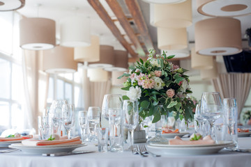 Wedding decor. Flowers in the restaurant, table setting