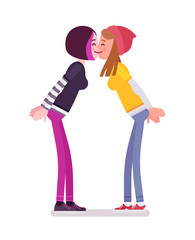 Young women exchanging kisses