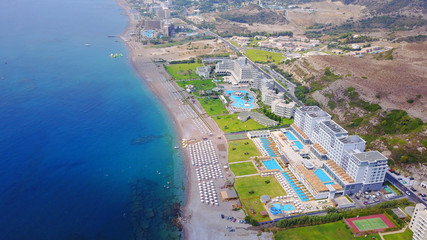 August 2017: Aerial drone photo of famous Kalithea beach seascape with clear waters and 5 star resorts, Faliraki bay, Rodos island, Aegean, Dodecanese, Greece