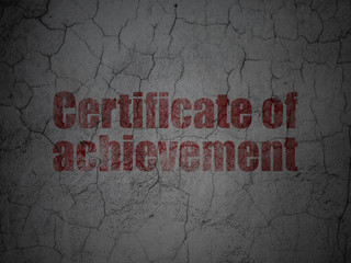 Learning concept: Certificate of Achievement on grunge wall background