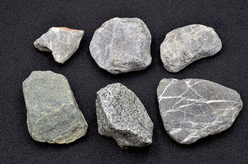 Stones against dark background close up photo