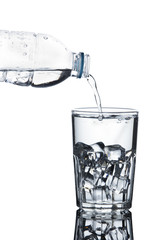pouring water on a glass