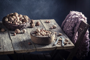 Fresh various nuts with on rustic wooden table