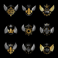 Fototapeta na wymiar Majestic Crowns and Ancient Stars emblems set. Heraldic Coat of Arms decorative logos isolated vector illustrations collection.