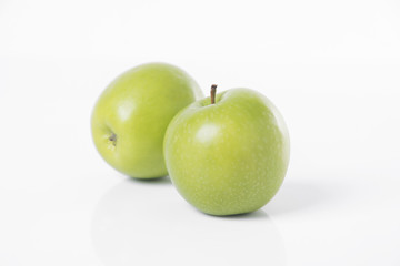 closeup fresh green apple isolated on white background.