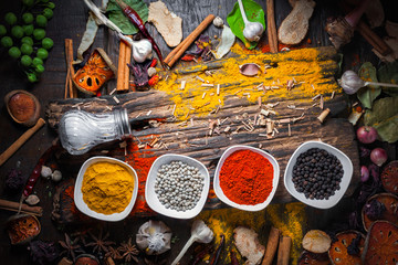 Selection of spices herbs and ingredients for cooking, Food background on wooden table, Top view, Thai cuisine.