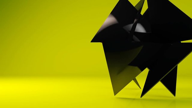 Glossy black geometric object particle transformation