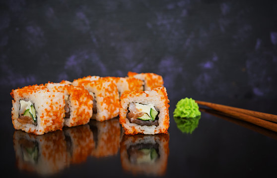 Sushi roll on dark background