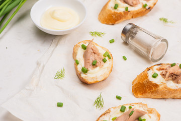 Italian cuisine. Bruschetta with tuna, onion, and mayonnaise.