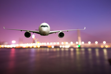 perspective view of jet airliner in flight with bokeh background © 安琦 王