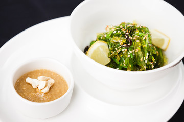 Seaweed salad with a sauce