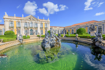 Baroque facade of Queluz National Palace and Neptune Fountain in Sintra, Lisbon district. Defined...