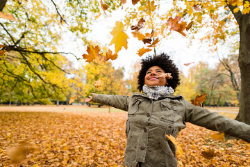 Young woman spreading her arms wide