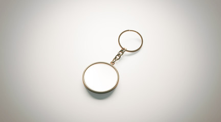 Blank gold round white key chain mockup isometric view, 3d rendering. Clear golden circular...
