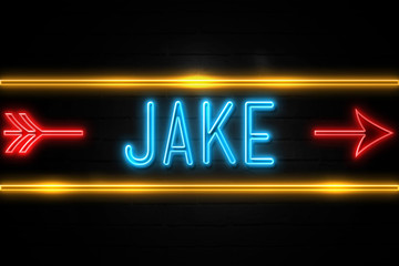 Jake  - fluorescent Neon Sign on brickwall Front view - obrazy, fototapety, plakaty
