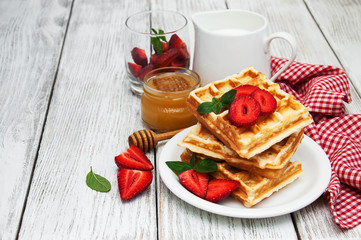 belgian waffles with strawberries and mint