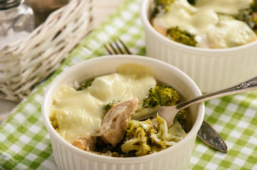 Casserole with broccoli, rice, chicken and mozzarella cheese.