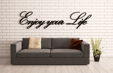 Sofa mit Spruch an der Wand