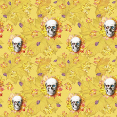 Watercolor drawing seamless background human skull for halloween with autumn yellow leaves and flowers in the eye sockets for print, decor on a yellow background