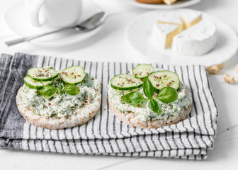 flatbreads with dip of cheese with cucumber