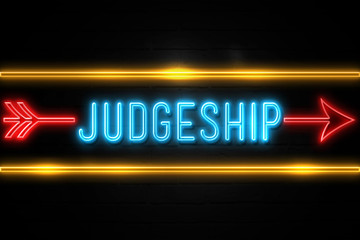 Judgeship  - fluorescent Neon Sign on brickwall Front view