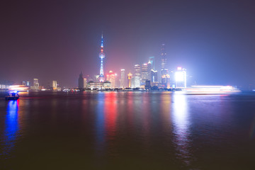 Shanghai, China city skyline on the Huangpu River.
