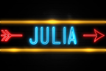 Julia  - fluorescent Neon Sign on brickwall Front view - obrazy, fototapety, plakaty