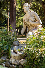 Statues in park and plants