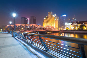 Shanghai Waibaidu bridge panorama at night with colorful light over river