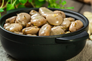 Broad beans stewed with onion and oregano