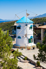 Old Windmill in Agios Nikolaos near blue caves in Zakynthos (Zante) island, in Greece