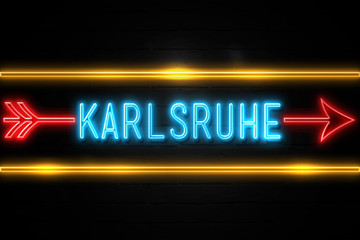 Karlsruhe  - fluorescent Neon Sign on brickwall Front view