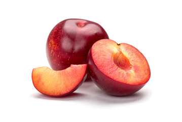 plums isolated on white