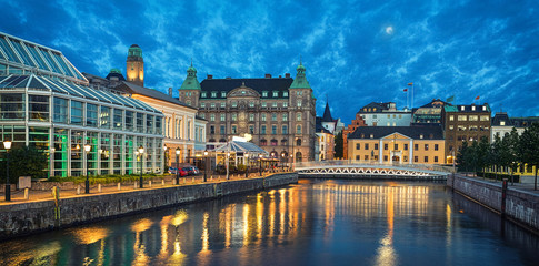 Fototapeta na wymiar Panoramic view of Malmo skyline from canal in the evening, Sweden