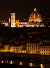 athedral Santa Maria of the Flowers and the Arno River, Piazza del Duomo, Florence, Tuscany, Italy, Europe. While the Basilica is keeping the City safe, buildings stare their reflection in the River