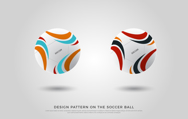Obraz premium design pattern on the soccer ball. red, orange, black and blue color on the football mock up. Ball Vector Illustration