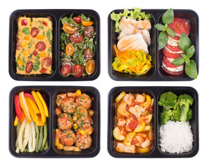 Healthy take away meals in containers isolated on white background, top view