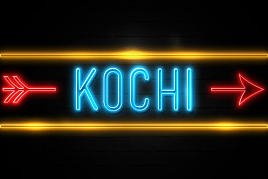 Kochi  - fluorescent Neon Sign on brickwall Front view