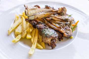 juice roasted lamb chops on the table