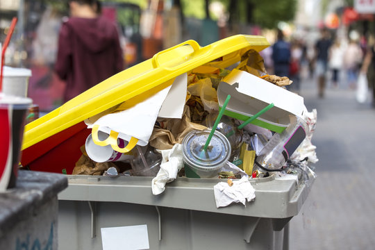 Overfull Trash Can In The Public