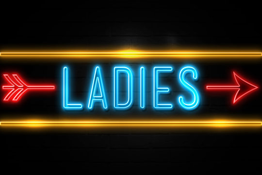 Ladies  - fluorescent Neon Sign on brickwall Front view
