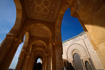 Fototapeta na wymiar King Hussan II Mosque archways, Hassan II Mosque during the blue sky in Casablanca, Morocco