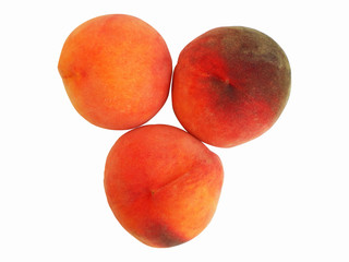 Peaches isolated on white background. Three ripe peach