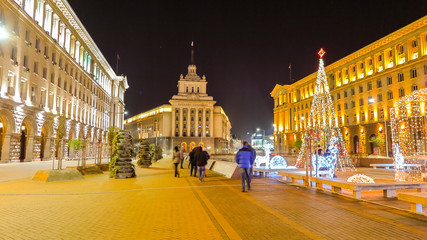 Fototapeta na wymiar Beautiful night view in downtown Sofia Ministerial Council, the National Assembly and the presidency with Christmas decorations. Bulgaria