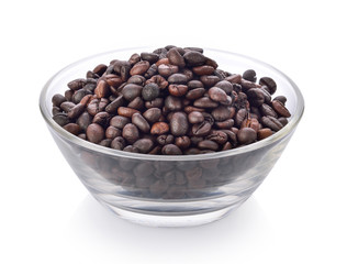 coffee seeds in a bowl on white background