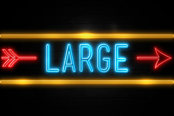 Obraz premium Large - fluorescent Neon Sign on brickwall Front view