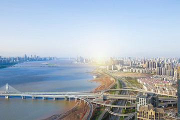 Obraz premium Aerial view of city buildings and river, China Nanchang