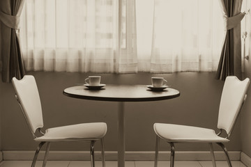 two cup of coffee on table vintage color tone meeting concept