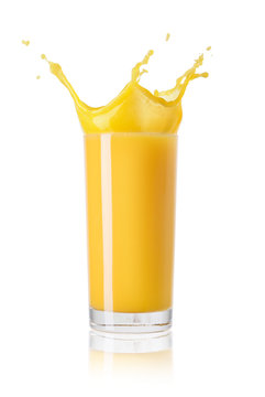 juice splashing in the glass isolated on white background